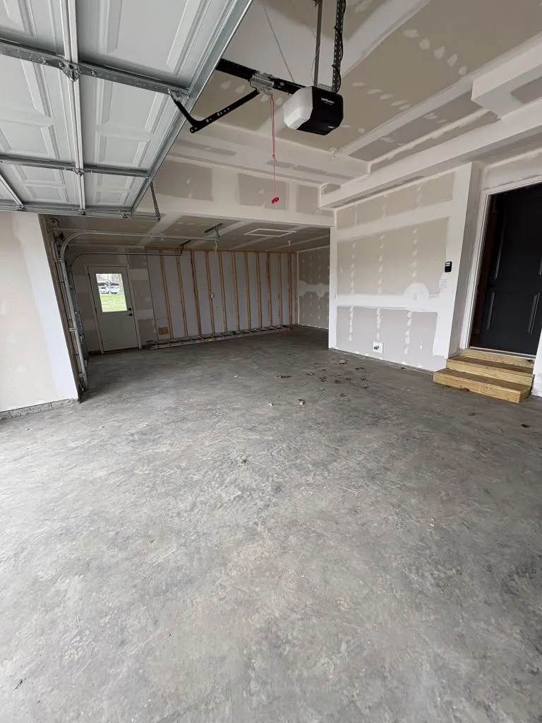 Garage interior with drywall work in progress