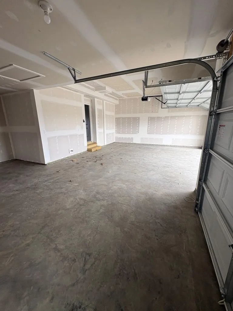 Garage drywall installation in progress