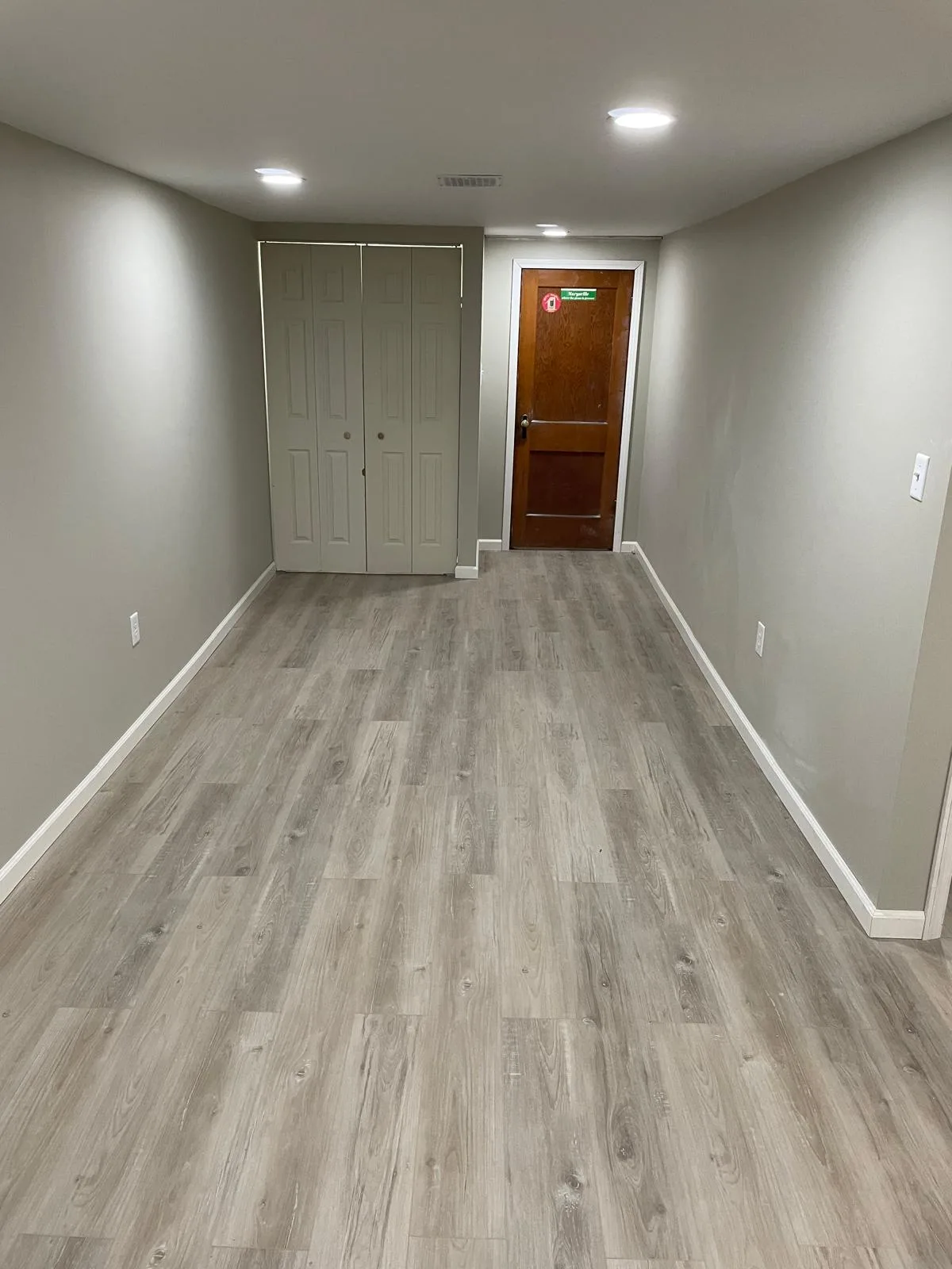 Finished interior room with new flooring and wall finishes