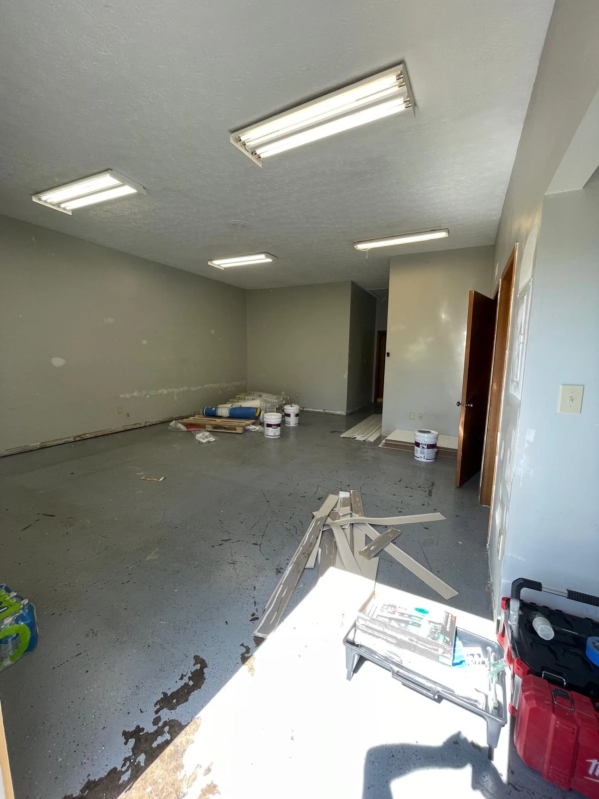 Same interior room during renovation before new flooring and finish work